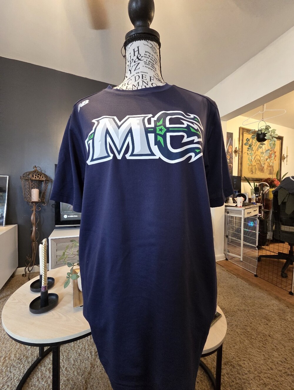 New Balance Navy Short Sleeve Graphic Tee with White & Green Logo
